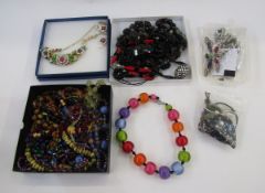 A quantity of glass bead necklaces, a modern heart pattern pendant and other costume jewellery (4