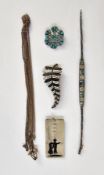 Silver ingot pendant with enamel decoration of two figures, a gilt metal and enamel spray brooch