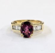 18K gold, pink stone and diamond dress ring set oval central stone, the shoulders set with