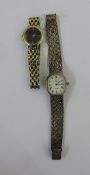 Lady’s Omega stainless steel wristwatch with blue face and a lady’s silver Omega wristwatch (2)