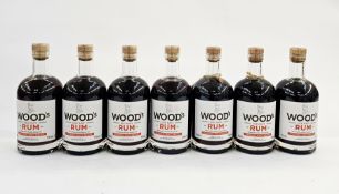 Seven bottles of Woods Old Navy Rum harvested from the finest demerara cane from original navy