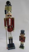 Large painted wooden Christmas soldier nutcracker with moveable mouth, 86cm high, and another