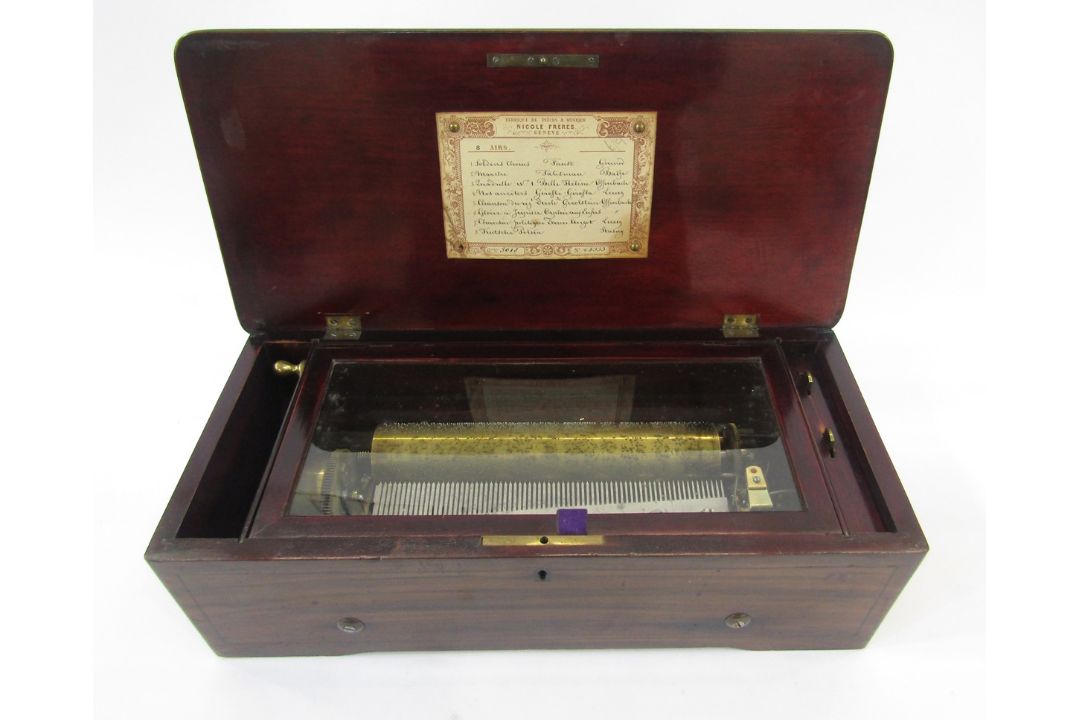 Swiss lever wind musical cylinder box bearing a label for Nicole Freres Geneve and listing eight - Image 1 of 4