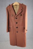 A vintage tailor made silk mix overcoat with maker's label.