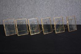 Six gold metal easel picture frames. H16 W.11cm. (each)