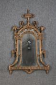 A contemporary gilt metal framed wall mirror. H.95 W.60cm.