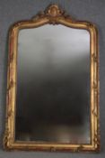 A large overmantel or pier glass, French 19th century giltwood and gesso, Rococo cresting with