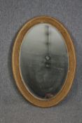 A C.1900 gilt framed mirror with bevelled plate. H.96 W.66cm.