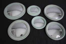 Six contemporary convex mirrors. Dia.23cm.(largest)