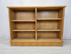 A light oak dwarf open bookcase. H.88 W.120 D.28cm.