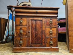 An early 19th century flame mahogany dwarf side cabinet. H.74 W.74 D.42cm.