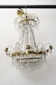 A basket chandelier with gilt metal frame and crystal swags and drops. H.90 W.55cm.