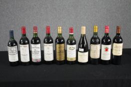 Ten bottles of French red wine. Eight bottled in the early 80s, one in 1990 and a Pinot Noir bottled