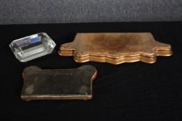 A cut glass piece paperweight with two giltwood stands. L.39 W.15cm. (largest)