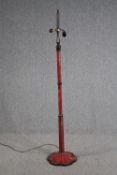 A Tiffany style floor lamp with two bulb holders.