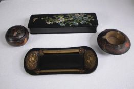 A lacquered box, ashtray, trinket box and a small tray. H.20 W.9cm. (largest)