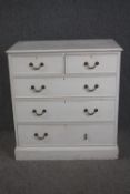 A chest of drawers. C.1900 painted in white. A little worn with one handle missing. H.107 W.100 D.