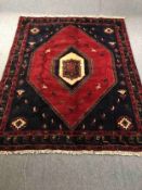 Carpet, Persian Kalardasht with a central lozenge medallion on a midnight ground within stylised