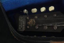 Two banjos one by Savana and one by CH & S. Melody Maker banjos. Both with a tobacco burst finish to