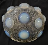 René Lalique, Art Deco opalescent glass wall sconce with 'Soleil' pattern, decorated with relief