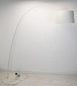 A contemporary white metal floor standing arc lamp. H.201 W.190cm.