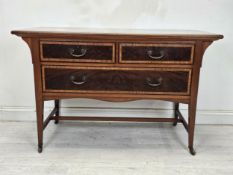 An Edwardian mahogany and satinwood chest of drawers. H.78 W.112 D.57cm. (Previously with fitted
