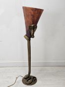 A French brass standard lamp, after a design by Edgar Brandt. Cast as a coiled cobra with a Verre De