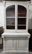 A late 19th century two section library bookcase, mahogany, later painted. H.224 W.115 D.77cm.