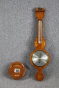 A barometer with a matching calendar. H.96cm.