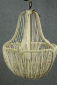 Matilda Chandelier. Made by Soho Homes. Coconut beans and iron. H.89cm.