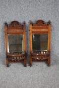 A pair of late 19th century walnut, wall mirrors. H.66 W.29cm. (each)