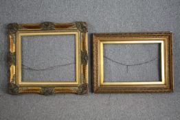 Two decorative wooden frames painted gold. H.75 W.83cm. (largest)