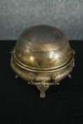 A serving bowl with a tilted oval cover. H.17 Dia.17cm.
