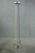 A ceiling light made up of a cluster of jam jars with coloured cable. L.147cm.