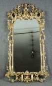 Pier mirror, full height carved giltwood in the Chinese Chippendale style. H.200 W.100cm.