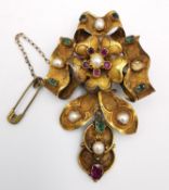 A 19th century yellow metal (tests as gold) sculptural floral design articulated brooch, set with