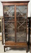 Bookcase, Georgian style mahogany on an associated base. H.199 W.101 D.34cm.