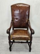 Armchair, 19th century Continental walnut in tan leather upholstery. H.128 W.59 D.76cm.