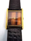 A boxed vintage 18ct yellow gold plated automatic Favre Leuba gentleman's watch with square face.
