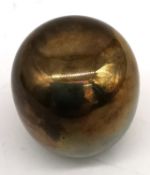 Piet Hein, Danish, (1905-1966), a mid century polished bronze 'Super Egg' in black leather pouch.