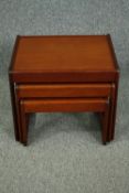 A nest of mid century teak graduating occasional tables. H.42 W.51 D.41cm. (Largest).