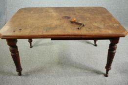 Dining table, Victorian walnut with fixed central leaf. H.74 W.148 D.104cm.