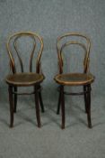 Two vintage bentwood cafe chairs.
