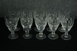 A set of ten cut crystal Thomas Webb wine glasses. H.12cm. (Each)
