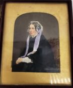 Two Victorian travelling leather photo frames with burgundy velvet and gilding, one containing a