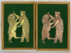 An identical pair of mounted Eastern relief plaques, one copper and the other brass. H.49 W.33cm.