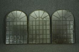A set of three distressed metal framed window pane garden mirrors. H.80 W.50cm. (each)