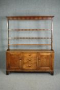 Dresser, 19th century country oak with upper open plate rack above base fitted with drawers