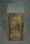 A gilt metal urn stand with glass top. H.71 W.26 D.26cm.