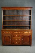 Dresser, Georgian oak and mahogany inlaid, H.200 W.159 D.47cm. (In two parts).
